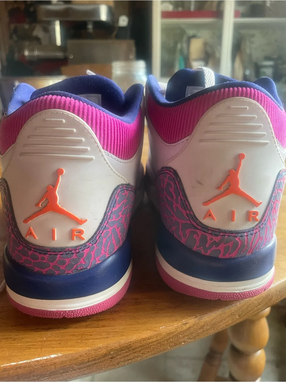 Nike Kids White Sneakers with Pink and Purple Accents
